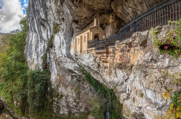 Outside view of the Holy Cave Covadonga built in the mountain