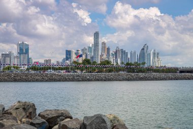 Panoramic View of the Skyscrapers with Panama flags in Panama City. View from Cinta Costera 3.