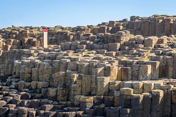 Seascape Exposure in Giant\'s Causeway UNESCO World Heritage Site, is an area of about 40,000 hexagonal basalt columns interlocking , the result of an ancient volcanic fissure eruption. It is located in County Antrim on the north coast of Northern Ire