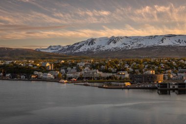 Beautiful view of Akureyri Old Town at Sunset from a high point in a summer day.