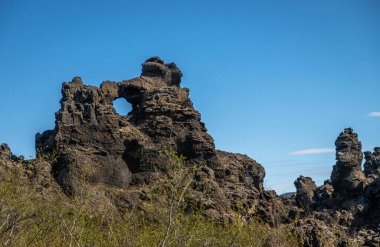 Dimmuborgir Exposure or the Black Fortress, is a dramatic expanse of lava in the Lake Mvatn area. Steeped with folklore, it is one of the most popular destinations for travellers to North Iceland.
