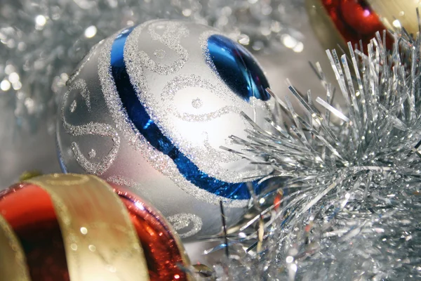 Christmas ornaments and tinsel — Stock Photo, Image