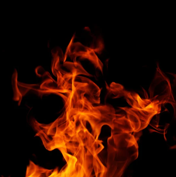 Feuer auf schwarzem Hintergrund — Stockfoto