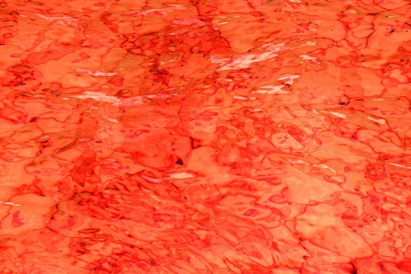 Fond abstrait orange de surface ondulée de l'eau — Photo