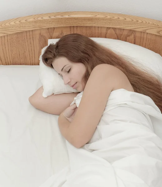 Beautiful girl sleeping in bed — Stock Photo, Image