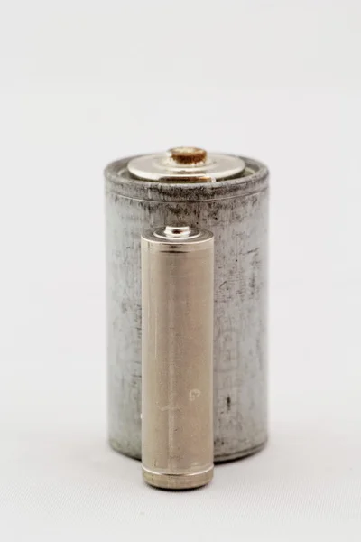 Old batteries on white background — Stock Photo, Image