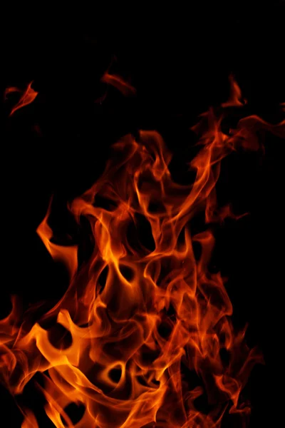 Вогонь на чорному тлі Ліцензійні Стокові Фото