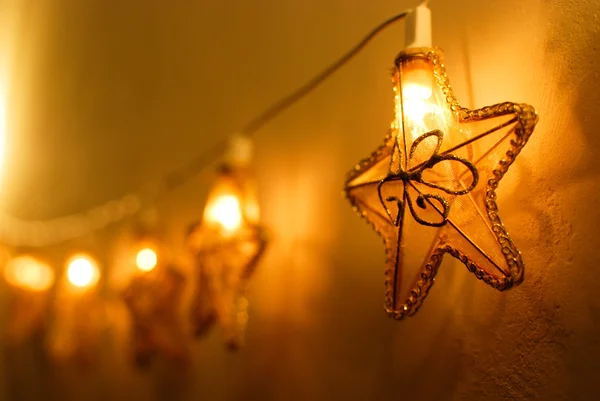 Luci di Natale a forma di stella calda Fotografia Stock