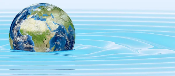 Planeet aarde in water Stockafbeelding