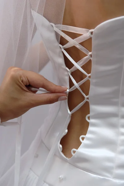 Bride dress corset hand — Stock Photo, Image