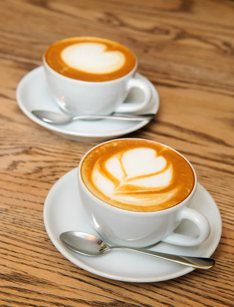 Two cappuccino cups — Stock Photo, Image