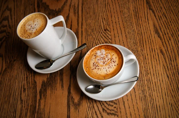 Two cups cappuccino and latte — Stock Photo, Image
