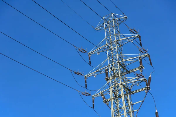 Electric Power Transmission Blue Sky Background — Stock Photo, Image