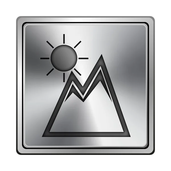 Горы с иконой солнца — стоковое фото