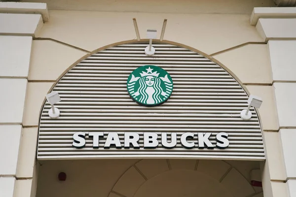 Corfu, Greece - 10.07.2021: Starbucks coffee sign and logo — Stock Photo, Image