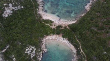 Yunanistan 'ın Korfu adasındaki Porto Timoni sahili ve korsan hangarının havadan görüntüsü