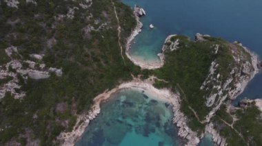 Yunanistan 'ın Korfu adasındaki Porto Timoni sahili ve korsan hangarının havadan görüntüsü
