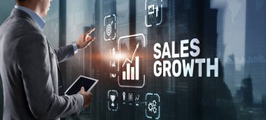 Satışlar Büyüyen Adam sanal 3 boyutlu ekrana yazıyı tıklattı