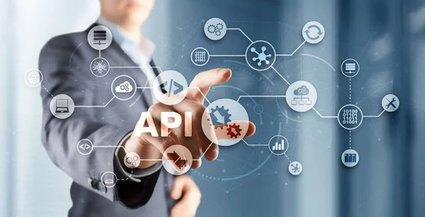 Interfaccia di programmazione delle applicazioni. Strumento di sviluppo software API. Concetto di informatica. Businessman preme l'icona di testo API su un'interfaccia virtuale — Foto Stock