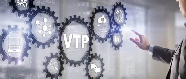 The man clicks on the inscription VTP. VLAN Trunking Protocol. Virtual Local Area Network — Stock Photo, Image