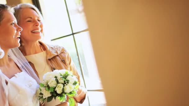 Proud Grandmother Posing Granddaughter In Wedding Dress Stock