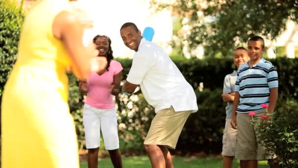 Ethnic lucky family paying baseball match — Stock Video