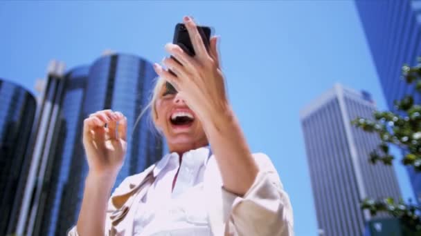 Female celebrating good news — Stock Video