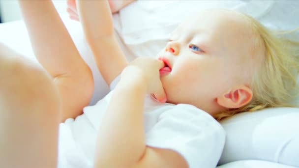 Young Mother Child Playing on Bed — Stock Video