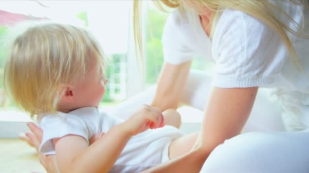 Beautiful Young Mom Child Playing on Floor — Stock Video