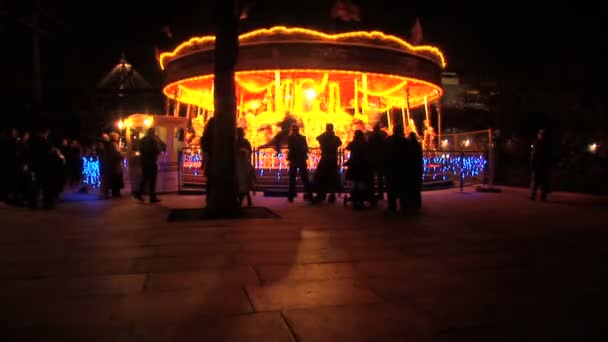 Fairground carousel at night in London at Christmas — Stock Video