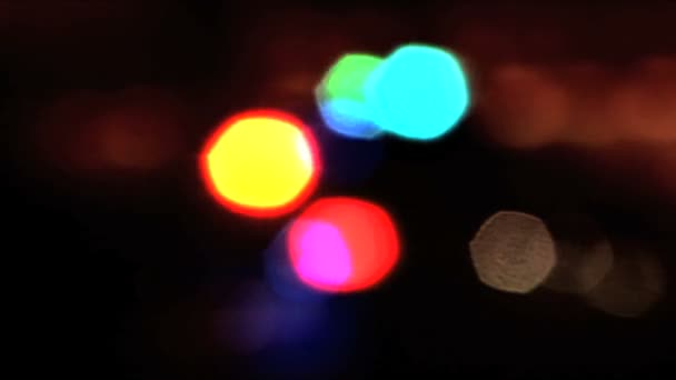Intreepupil knipperende lichten van een stad bij nacht — Stockvideo