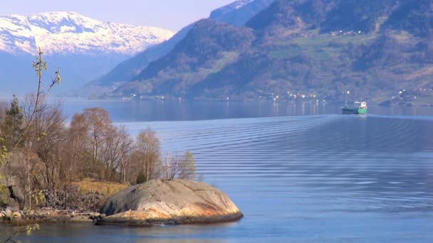 Oil tanker transporting North Sea oil along a glacial fjord — Stock Video