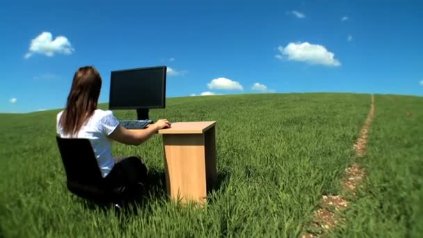 Young businesswoman in city clothes working in conceptual office without walls — Stock Video