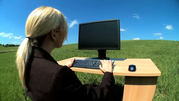 Young businesswoman in city clothes working in conceptual office without walls — Stock Video