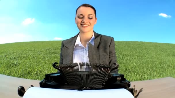 Young businesswoman in city clothes using old-fashioned typewriter — Stock Video