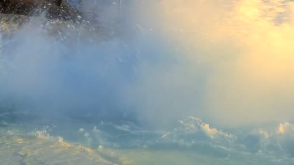 Steam coming from hot volcanic springs bubbling to the surface — Stock Video