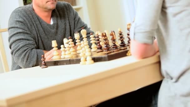 Relaxed Young Couple Playing Chess — Stock Video