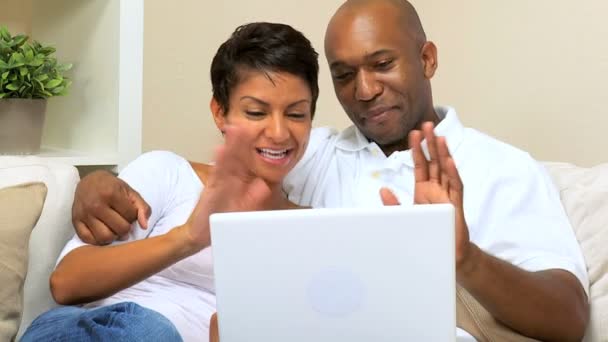 Ethnic Couple Using Laptop for Webchat — Stock Video