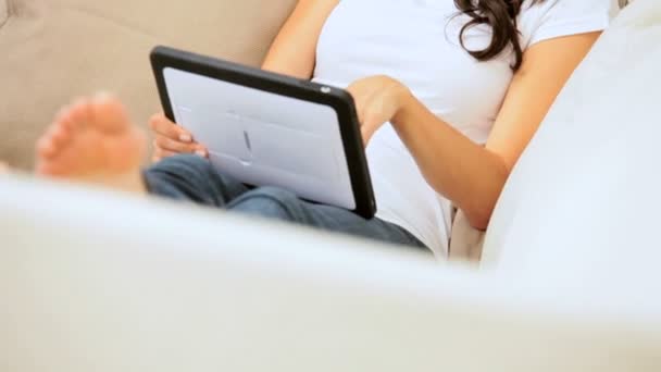 Brunette Girl Using Wireless Tablet at Home — Stock Video