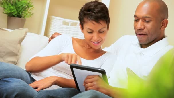 African-American Couple Using Wireless Tablet — Stock Video