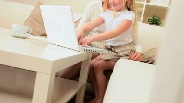 Loving Grandma with Grandchild Playing on Laptop — Stock Video