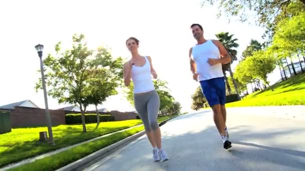 Attractive Couple Jogging to Keep Fit — Stock Video