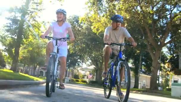 Retirement Cycling Exercise by Healthy Senior Couple — Stock Video