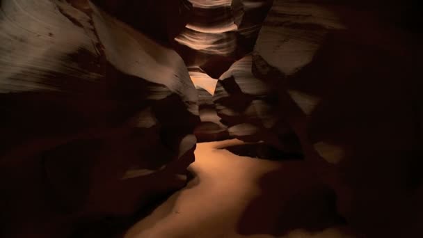 Motion jib shot inside red sandstone formations of Antelope Canyon — Stock Video