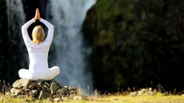 Yoga Exercises at Flowing Waterfall — Stock Video