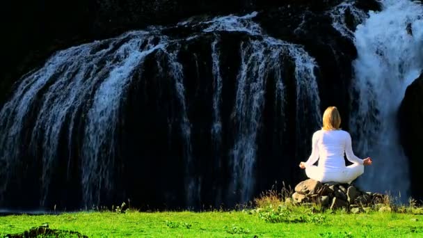 Female Practising Yoga by Waterfall — Stock Video
