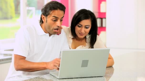 Asian Couple with Laptop Having Success Online — Stock Video