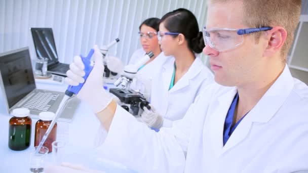 Three Research Assistants Working in Medical Laboratory — Stock Video