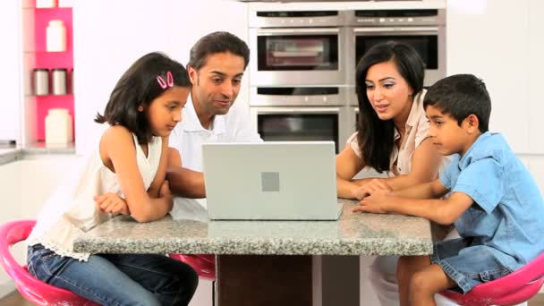 Young Ethnic Family Using Laptop for Webchat — Stock Video