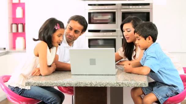 Young Ethnic Family Using Laptop for Webchat — Stock Video